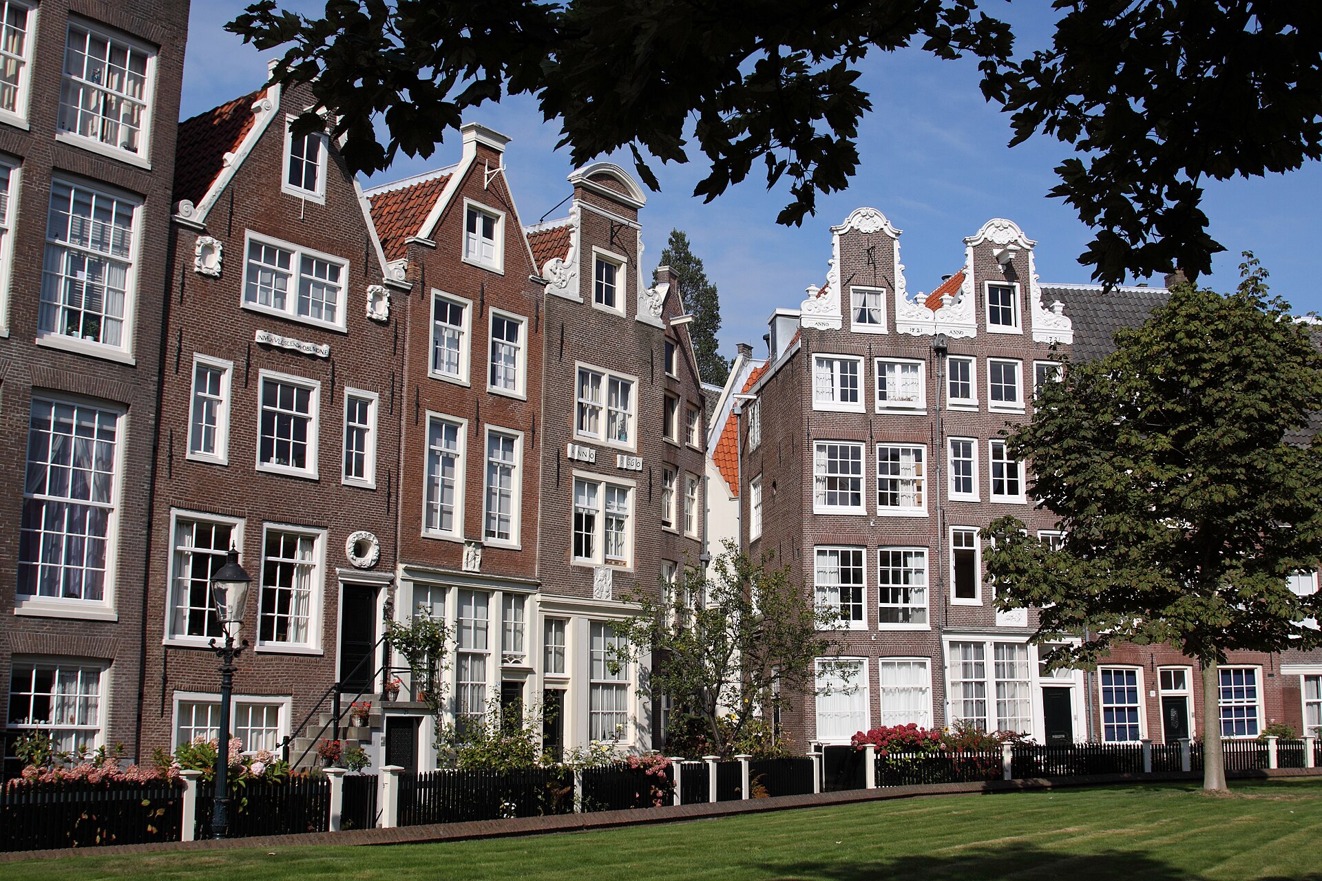Inside the Begijnhof - almshouses around a quiet central lawn, a step away from the Spui.